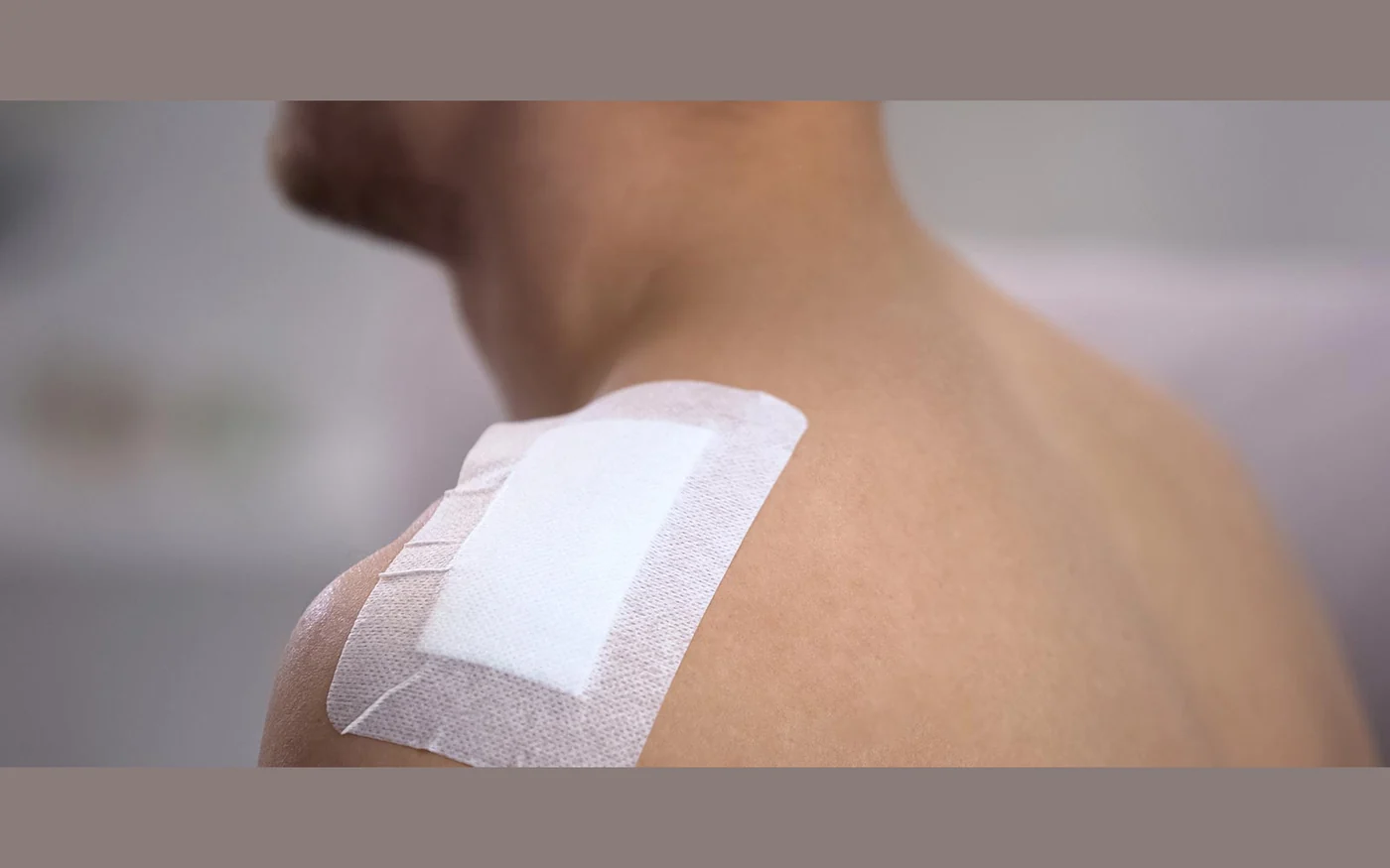 Perforated medical plaster material