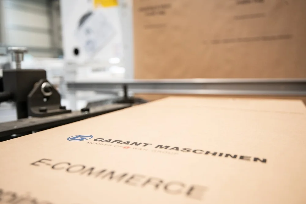 Printed paper e-commerce mailer on the line