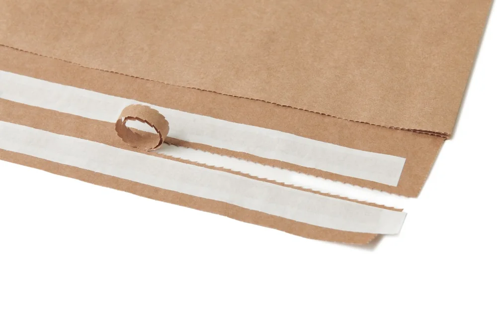 Paper mailer easy-opening tear-strip detail