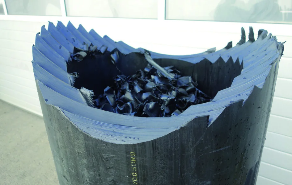 Large-diameter pipe fed into the shredder