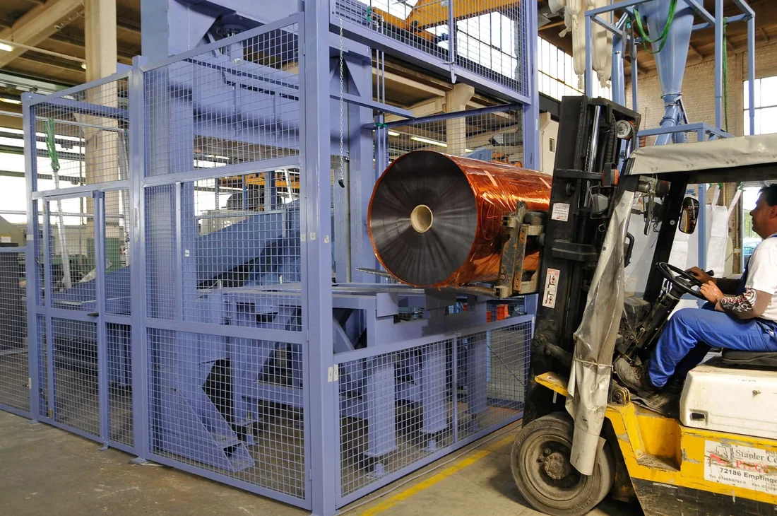 Bale loaded into the guillotine by forklift