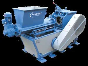 Granulator with screw force-feeding and conveyor