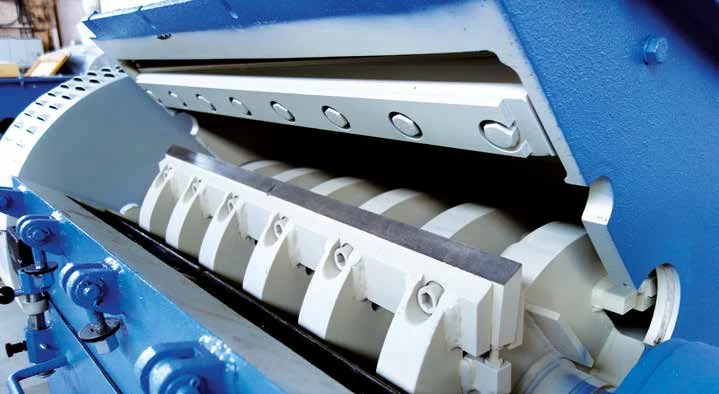 Open granulator showing rotor and stator knives