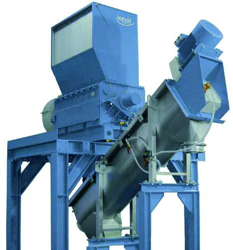 Wet granulator with infeed conveyor