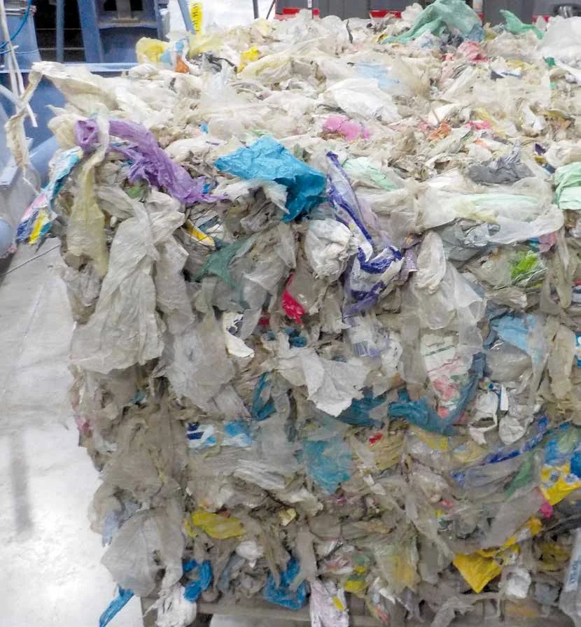 Baled mixed plastic waste — washing-line feed