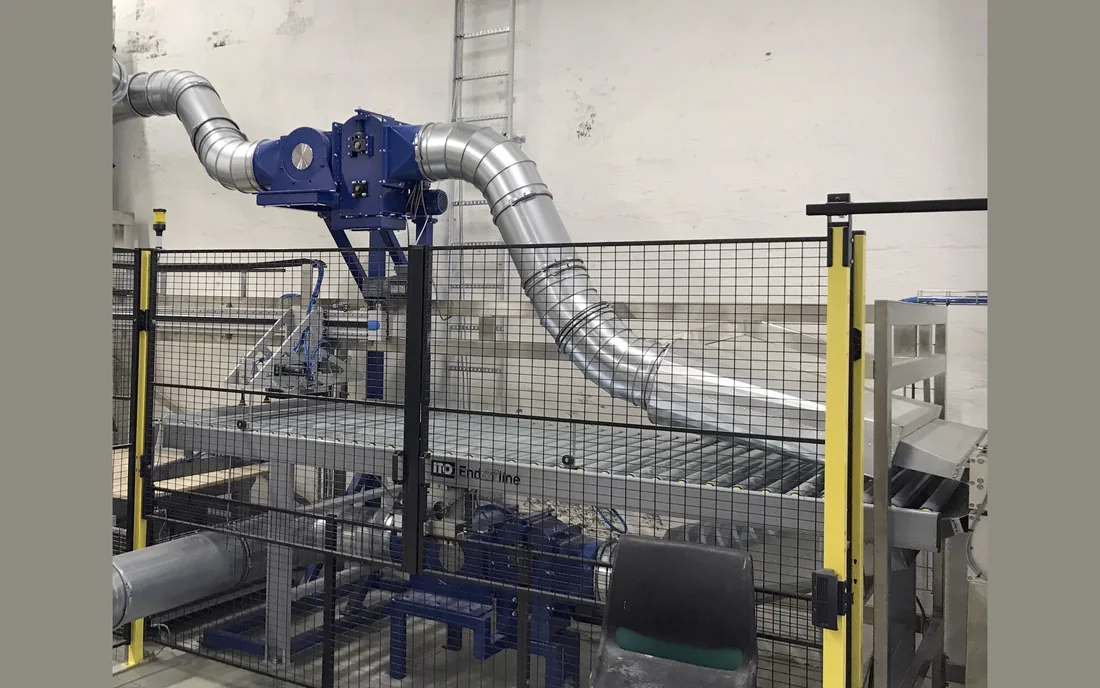 Unwrapping waste being fed in