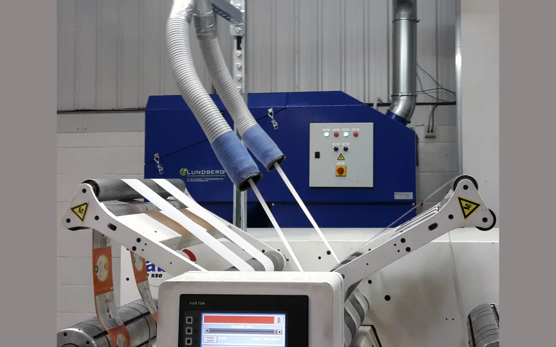 Edge-trim capture at the machine