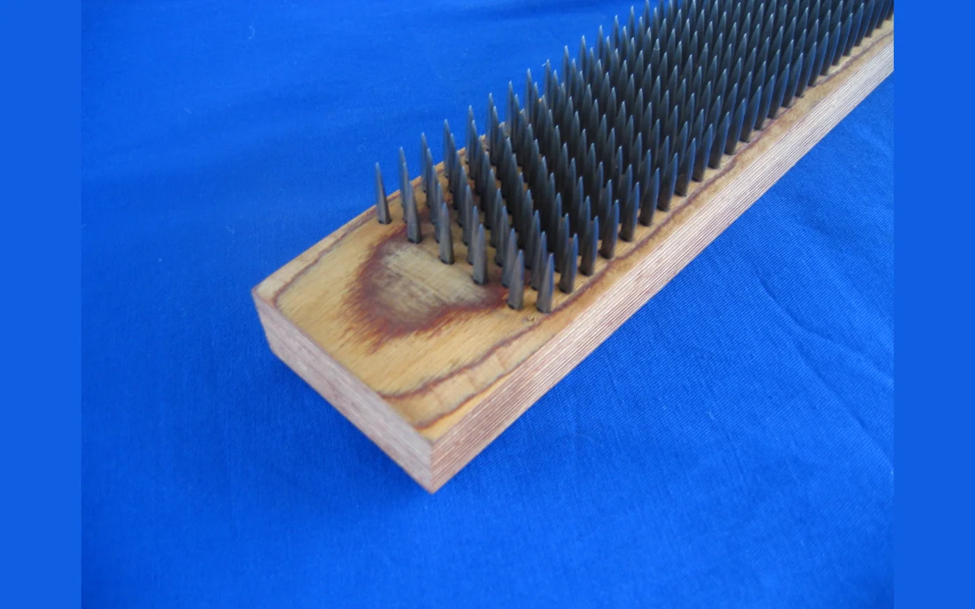 Tambula pinned lag in beech laminated wood