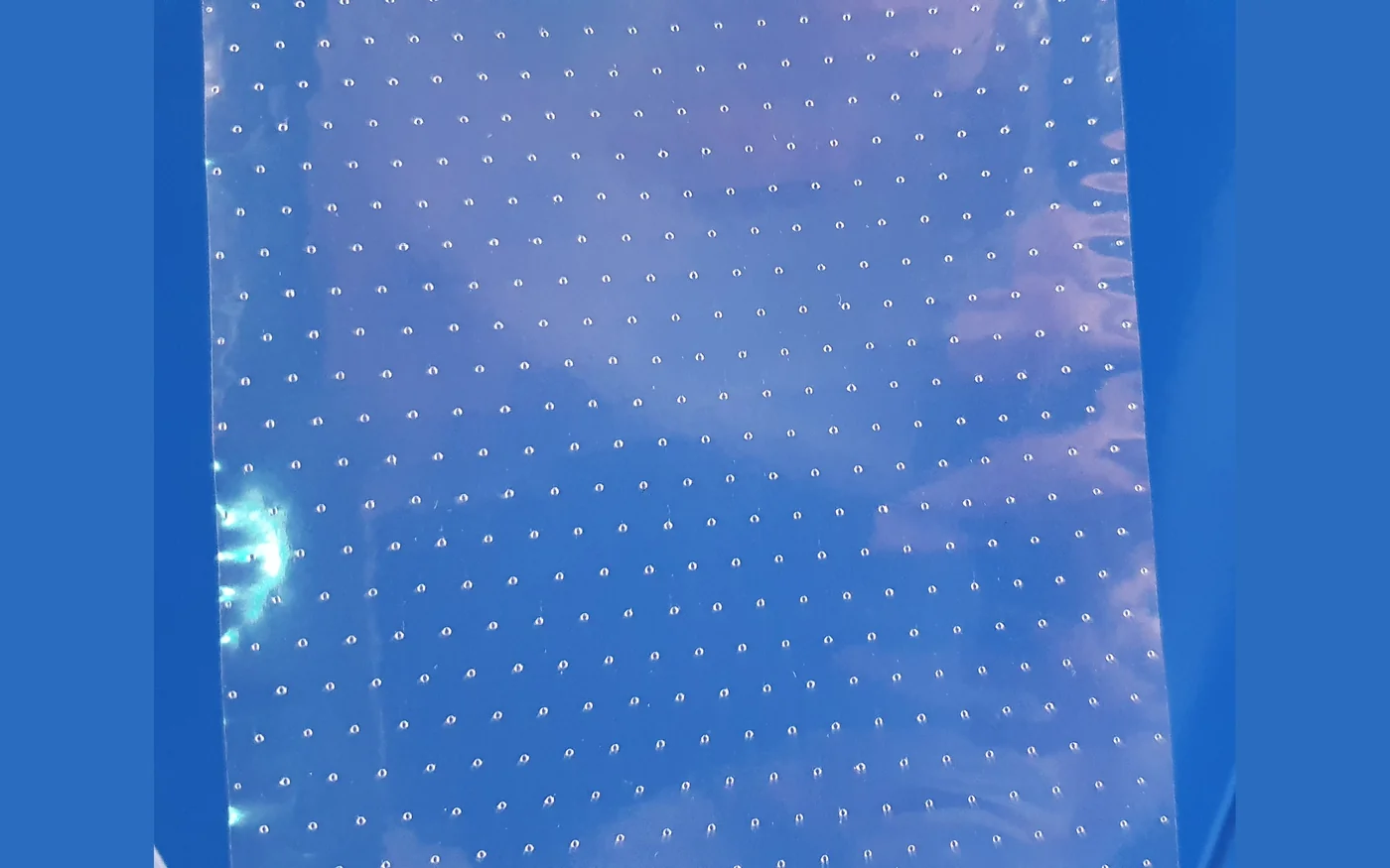 Perforated plastic film
