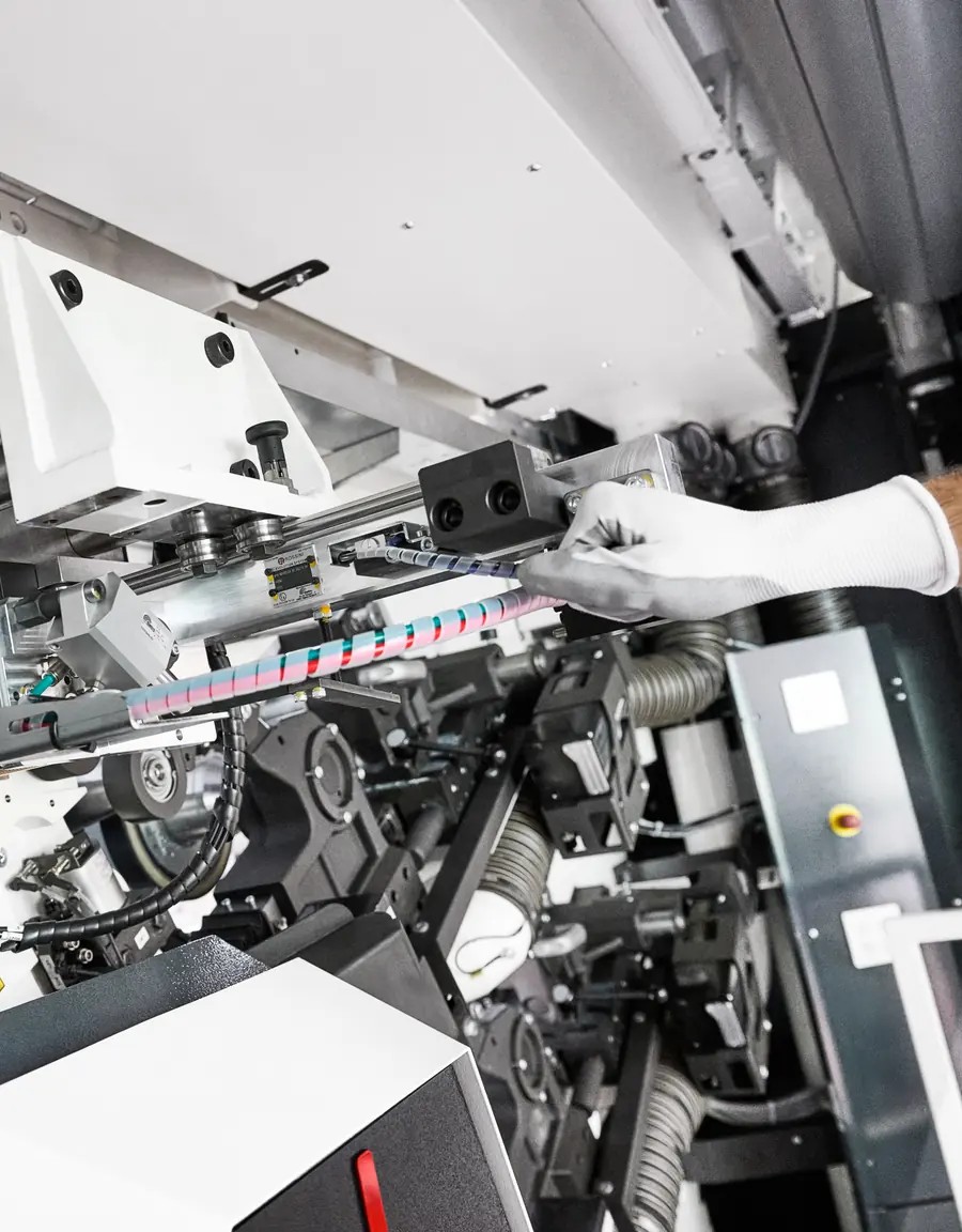Operator working inside a W&H ONEFLEX print unit